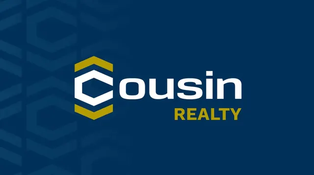 Cousin Realty logo on a navy background