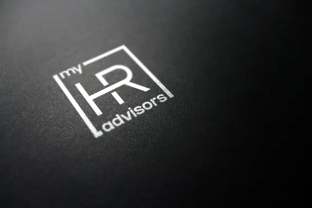 My HR Advisors logo in white on a black board