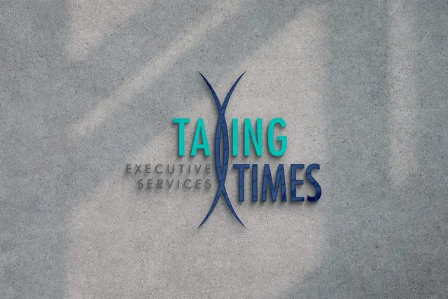 Taxing Times Executive Services logo on a concrete wall
