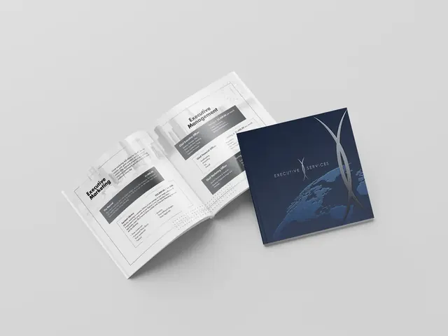 Executive Services brochure with a navy cover and open inside pages