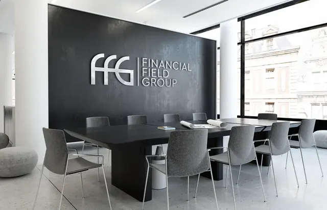 Financial Field Group logo in metal letters on a dark meeting-room wall