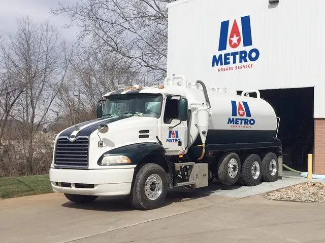 Metro Grease Service tanker truck with the logo on the tank and cab