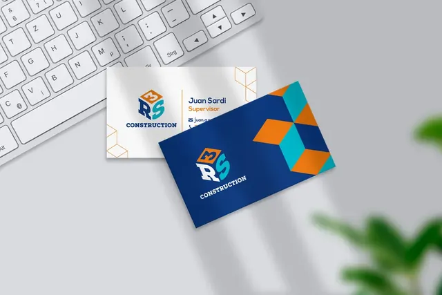 R3S Construction business cards in blue and orange