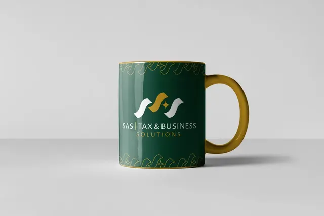 Dark green SAS Tax & Business mug with a gold handle