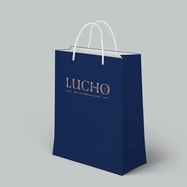 Navy shopping bag with the Lucho logo