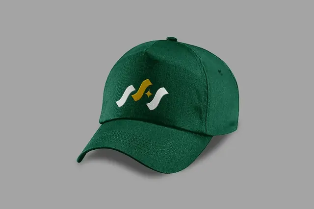 Green cap embroidered with the SAS Tax & Business mark