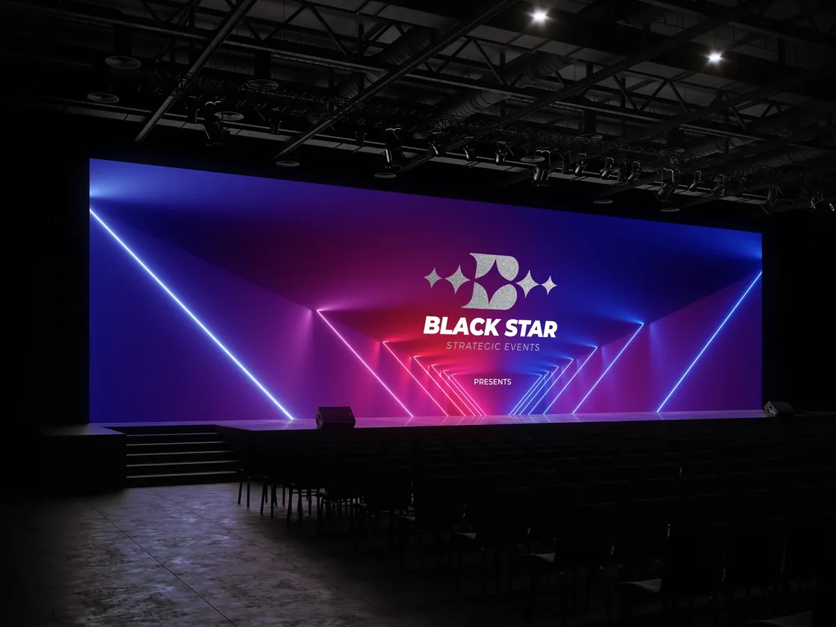 Black Star Strategic Events logo on a large stage screen with neon light lines