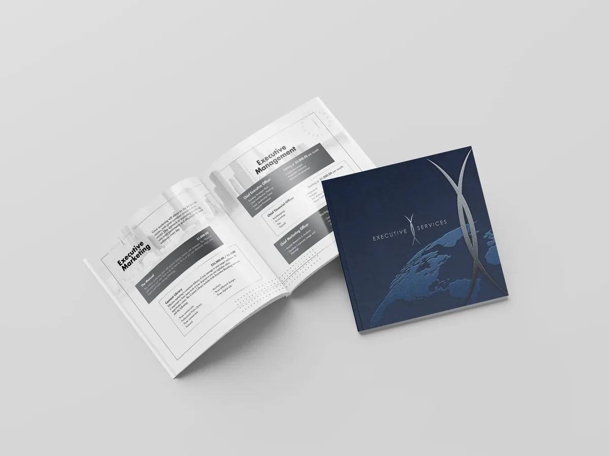 Executive Services brochure with a navy embossed cover and an open inside spread