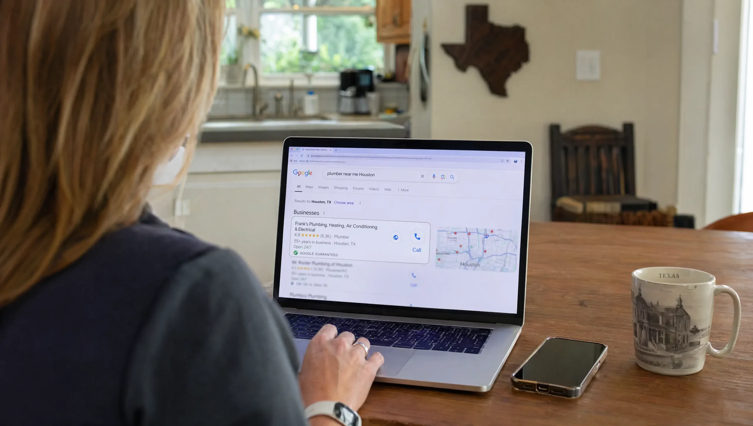 Houston homeowner searching Google for a local plumber and finding a top-ranked business listing